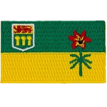 The top bar is green, the bottom bar is yellow. A coat of arms is in the left corner and Saskatchewan's provincial flower is in the right.