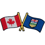 This badge displays the Canadian flag on the left and the Alberta flag on the right. The flag poles of each flag are crossed with each other, forming a X shape.