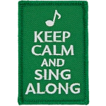 The words Keep Calm And Sing Along on a green background.