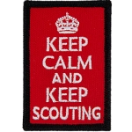 This red patch has a black merrow border. The words Keep Calm and Keep Scouting are embroidered under a white crown.