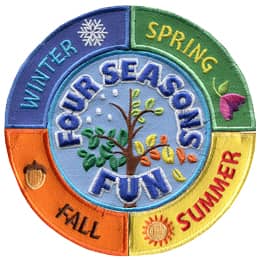 This circular set consists of five pieces: a center circle showing a tree in four different seasons and four outer rockers, each depicting a season.