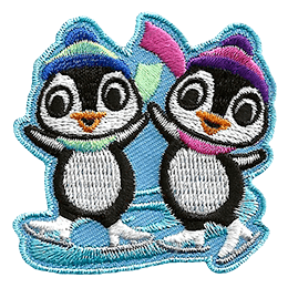 Two penguins skate on a swirl of ice. Both penguins wear winter hats and scarves.