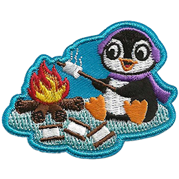 A penguin sits at a campfire roasting a s'more, wearing a purple scarf and earmuffs. 