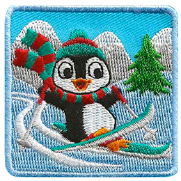 A penguin wearing a red and grey scarf skiing down a snow-covered hill.