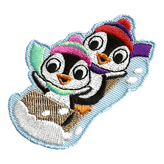 Two penguins raise their flippers in the air as they speed along on a wooden toboggan. The penguins are wearing toques and scarves.