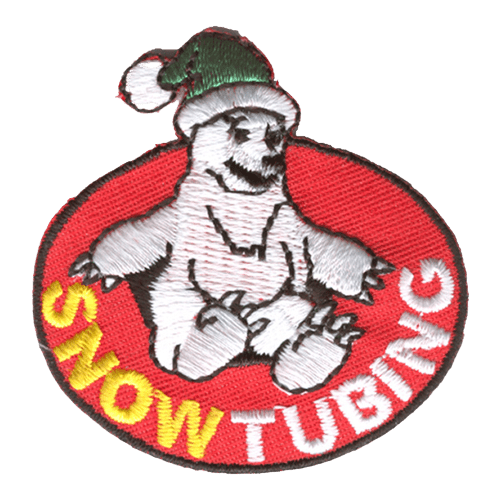A polar bear wearing a green hat is on a red inner tube. The words Snow Tubing are stitched below.