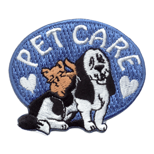 An orange cat sits on the back of a black and white dog. The words Pet Care are arched above them, framed by two hearts.
