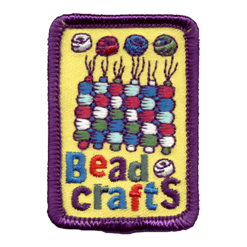 Pony beads are woven together with string to create a bead craft.