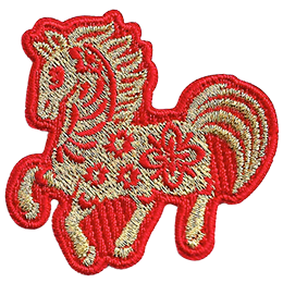 A gold horse with a red outline and floral details on its body.