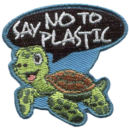 A turtle happily swims as it says Say No To Plastic in a speech bubble above his head.