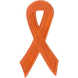 An orange ribbon is curled on itself to form a simple loop.