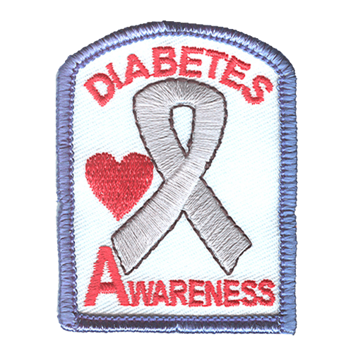 A white ribbon with the words Diabetes Awareness above and below it. A red heart is on the left.