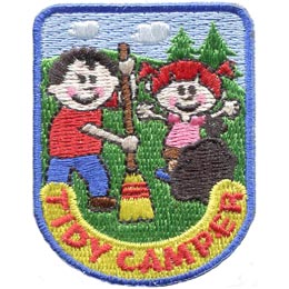 A boy and a girl work together to clean up their campsite and show that they are tidy campers.