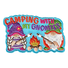 A male and female gnome are out camping and roasting marshmallows over a roaring campfire.