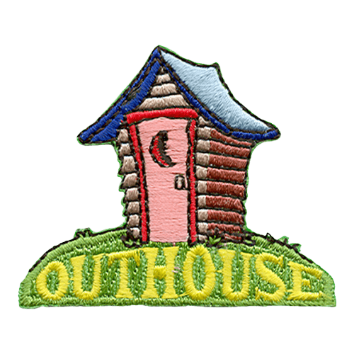 An outhouse with a moon carved into the door stands perched on a grassy hill with the words Outhouse.