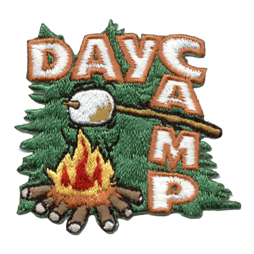 A campfire sits in front of a background of evergreens. A stick roasts a marshmallow over it. Day Camp is stitched in an L shape along the right.