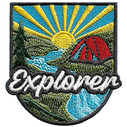 A round red tent sits in front of a setting sun. The word Explorer is in the foreground.