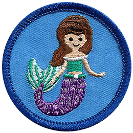 A mermaid with brown hair and a purple tail is on a blue circle.