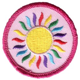 A sun with multi-coloured rays on a pink background.