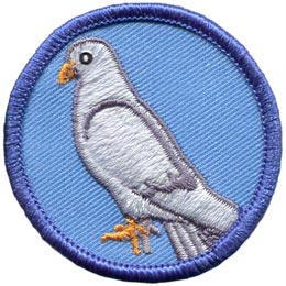 This patch displays the side view of a white dove standing on the ground. The dove is facing left.