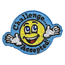 A yellow smiley face shrugs with a wide grin. The text Challenge Accepted! is stitched around it.