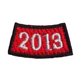 The number 2013 is stitched in white on a curved red background.