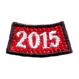 2015 is stitched in white on a curved red background.