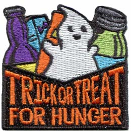 The words Trick Or Treat For Hunger are on a box with a ghost and non-perishable inside.