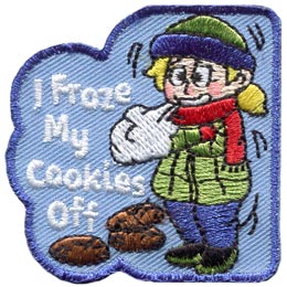 A young girl is bundled up in a hat, scarf, jacket, and thick pants as she stands shivering in the cold. Three cookies lie under the text ''I Froze My Cookies Off.''