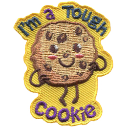 A chocolate chip cookie has a kawaii face (two dots for eyes and a U shaped mouth). It proudly stands with its hands on its hips. Above it are the words I\'m a Tough and below is Cookie.