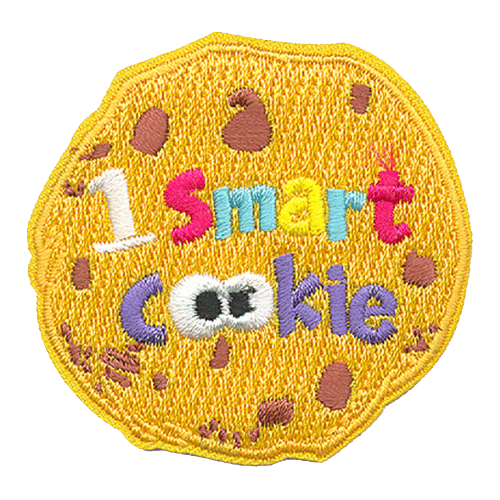 A chocolate chip cookie with the text 1 Smart Cookie stitched inside it. The Os in cookie are eyes.