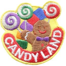 The words Candy Land are underneath a gingerbread man holding several lollipops.