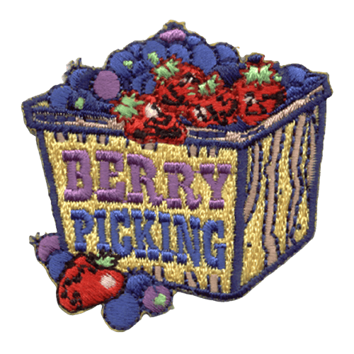 A basket of blueberries and strawberries. The words Berry Picking is stitched onto the side.
