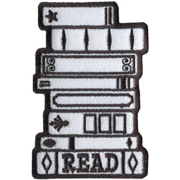 A stack of 8 books is outlined in black thread, with the bottom book titled 'Read'.