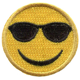 A yellow circle forms a smiley face with sunglasses and a big U-shaped smile.