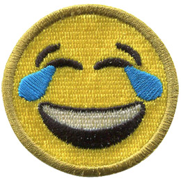 A yellow circle forms a smiley face with smiling eyes, tears, and a big laughing smile.