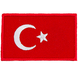 A red flag with a white crescent and star.