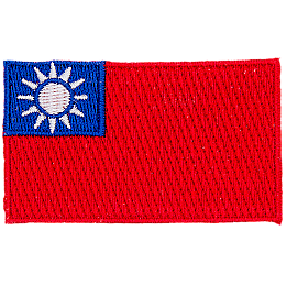 The flag of Taiwan consists of a red field with a blue canton bearing a white disc with twelve triangles surrounding it.