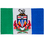 Three coloured bars from the left to the right: green, white, and blue. Yukon's provincial shield and flowers decorates the center of the flag.