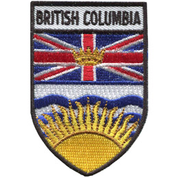 This shield shaped crest is broken up into three horizontal parts. At the top is the words 'British Columbia,' underneath it is the B.C. flag, and at the bottom is a rising sun.