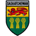 The word Saskatchewan is above the Saskatchewan provincial flag in the shape of a shield. 