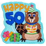 A beaver holding a birthday cake under the words Happy Beaver.