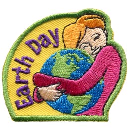 A women is show hugging the Earth and protectively holding it in her arms. The words 'Earth Day' are embroidered in an arch to the left of the graphic.