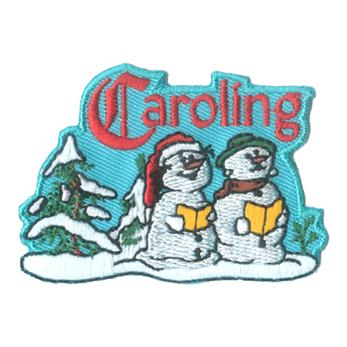 Two singing snowpeople holding yellow books in the snow with the word Caroling stitched above them.