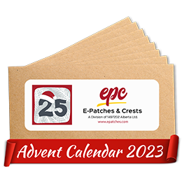 A set of envelopes with a red ribbon that reads Advent Calendar 2023.