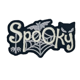 The word Spooky is surrounded by a spider and it's web, a bat, and a cat peering over the last two letters.