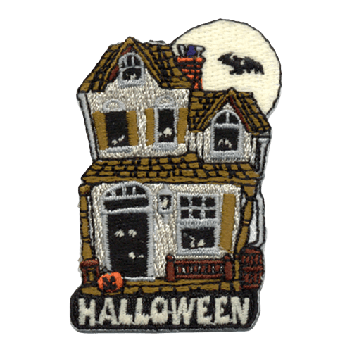 A two-storied haunted house with eyes in the windows and open doorway. A full moon eclipsed by a bat sits behind the house. Halloween is stitched at the bottom.