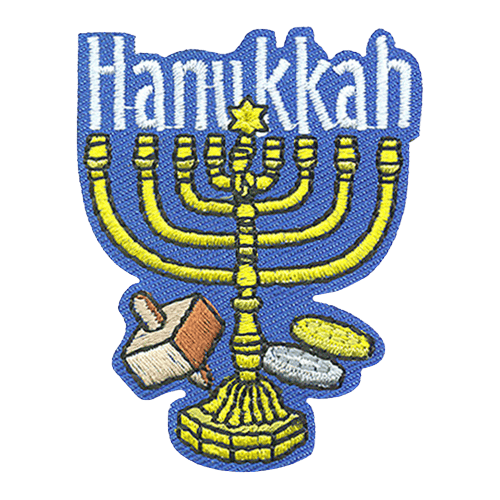 A Hanukkah menorah stands in the center of this crest. To the left is a dreidel and to the right are two sufganiyots.