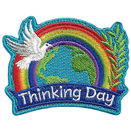 A rainbow arches over the globe. A dove is in front of it. The words World Thinking Day are on a ribbon across the bottom.