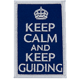 The words Keep Calm And Keep Guiding on a blue background.